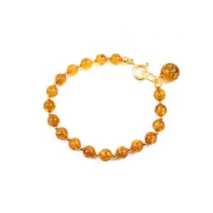 Dzintara Rokassprādze ar Zelta Krāsas Elementiem, ⌀ 5 cm Dzintara rokassprādze ar zelta krāsas elementiem, ⌀ 5 cm