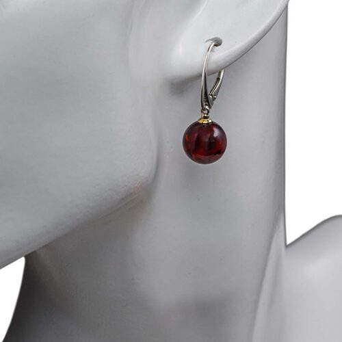 Dzintara auskari ar sudraba krāsas aizdari