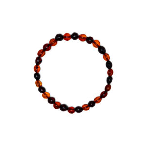 Dzintara aproce ar tumšām bumbiņām, ⌀ 6 cm