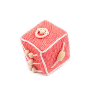 Crocheted activity cube, salmon color, 10x10 cm