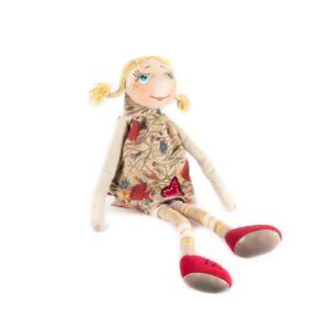 Smiling girl with golden braids - cute and adorable stuffed toy