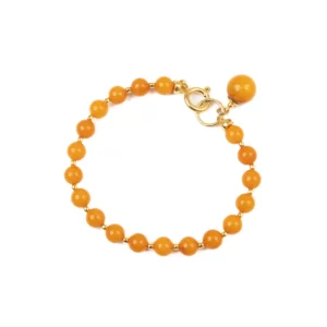 Amber bracelet with gold color elements, ⌀ 5 cm