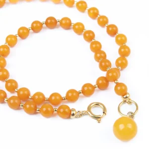 Amber necklace with gold color elements, 44 cm