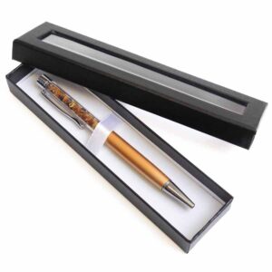 Pen with amber pieces, gold and silver color details, in a box