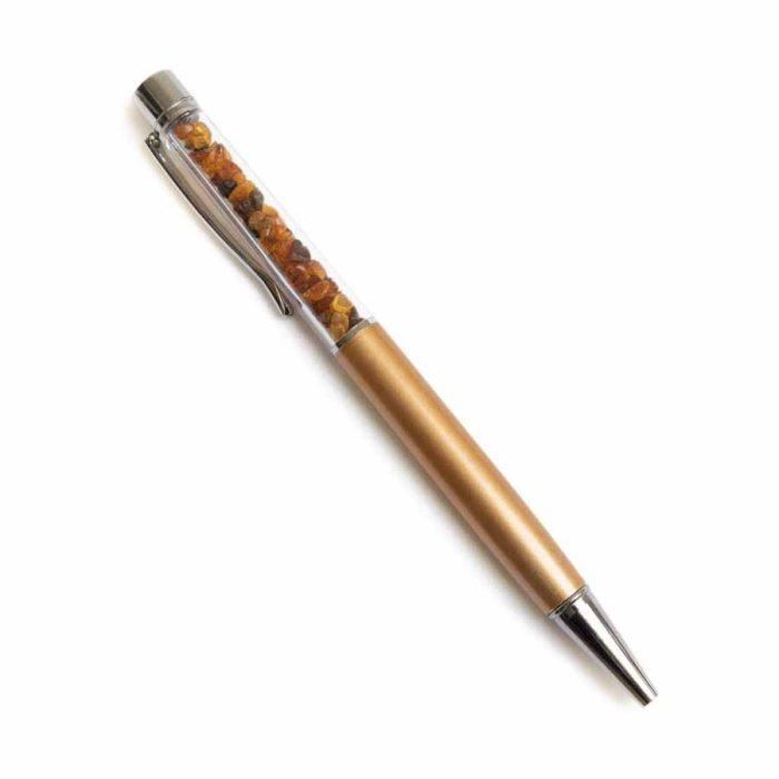Pen with amber pieces, gold and silver color details, in a box