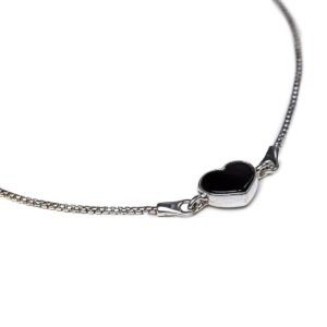 Silver bracelet with crimson amber heart