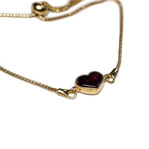 Silver bracelet with dark red amber heart, gold plated