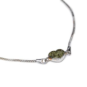 Silver bracelet with green amber heart