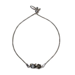 Silver bracelet with greenish amber kitty