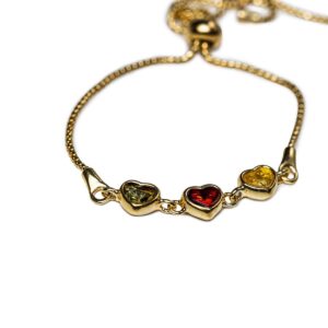 Silver bracelet with three amber hearts in different colours, gold plated