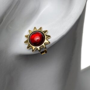 Silver earrings sun-shaped with crimson amber, gold plated