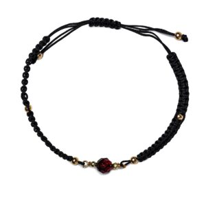 Bracelet with dark orange amber ball, black drawstring, ⌀ 5 cm