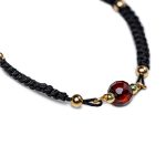 Bracelet with Dark Orange Amber Ball, Black Drawstring, ⌀ 5 cm