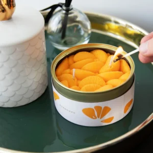 Can candle, peeled tangerines