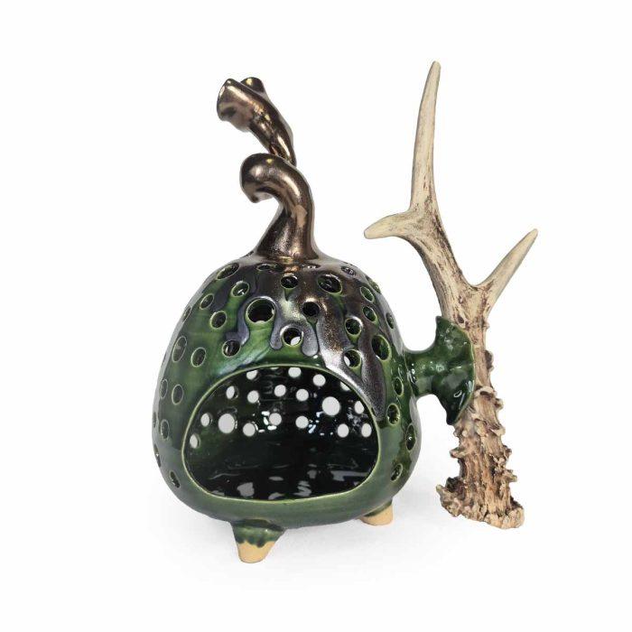 Ceramic candle holder with antler element, greenish-brown