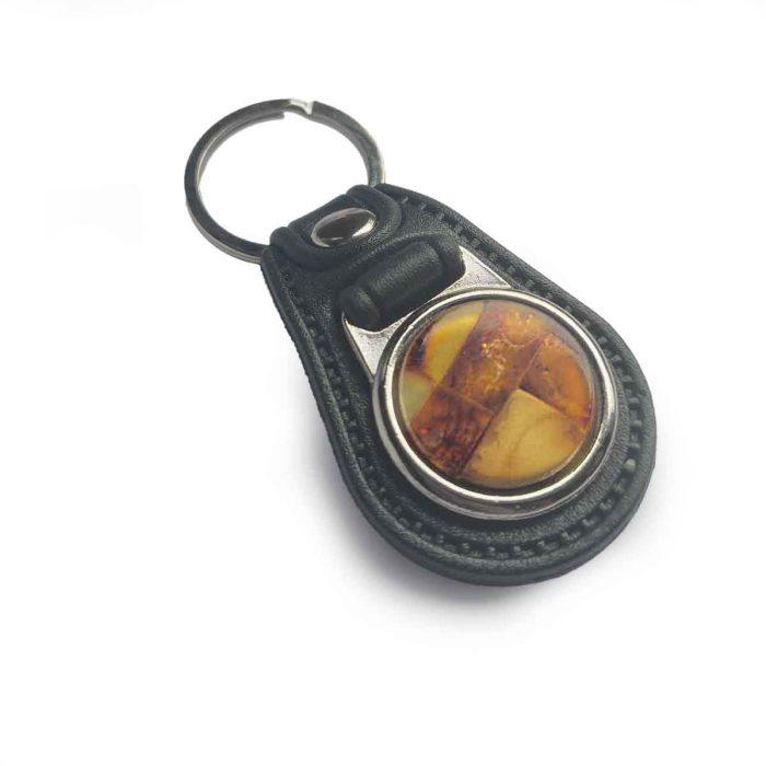 Leather keychain with amber, 7 cm