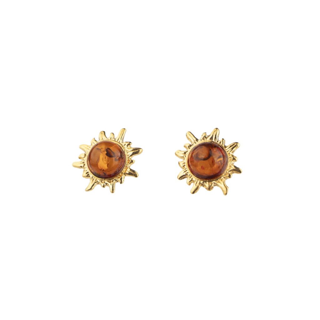 Silver earrings in sun shape with orange amber piece, gold plated