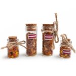 Amber Pieces in a Glass Bottle