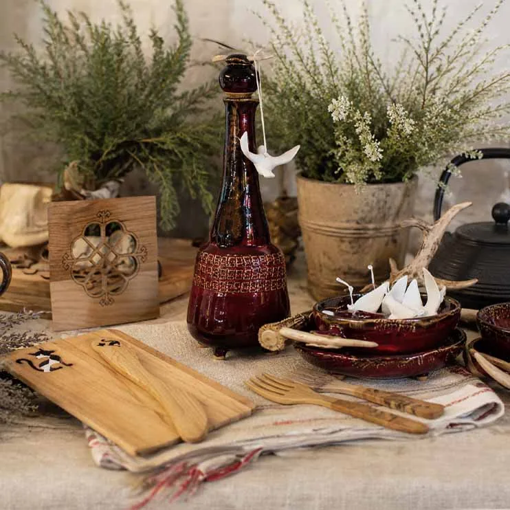 atvian Kitchen & Dining Collection – ceramic carafe 1 liter, wooden coaster small, carved serving board and artisan wooden utensils, Baltic gift ideas.
