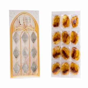 Open Sweet Amber caramel box showing 12 individually wrapped caramels