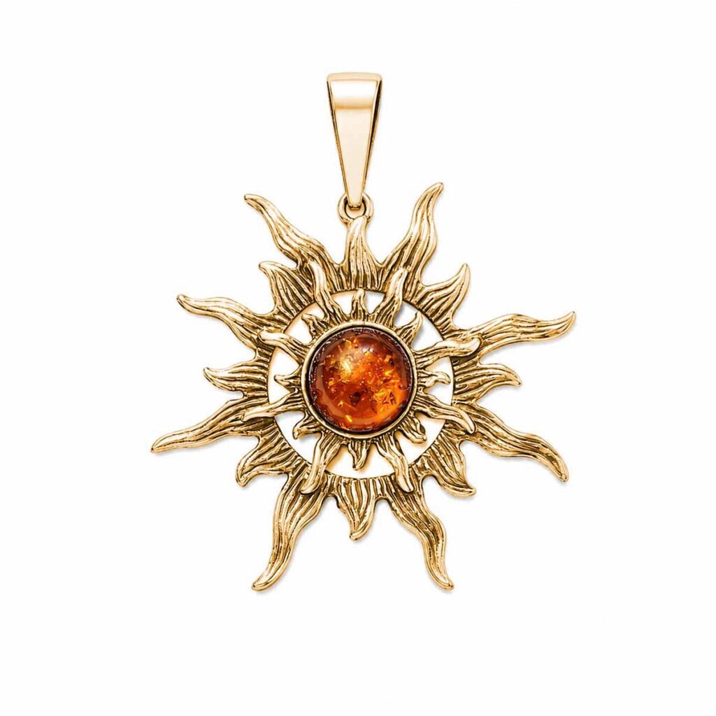 Silver pendant in sun shape with orange amber piece, gold-plated
