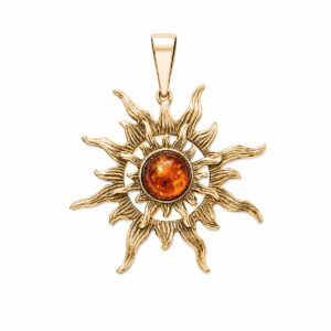 Silver pendant in sun shape with orange amber piece, gold-plated