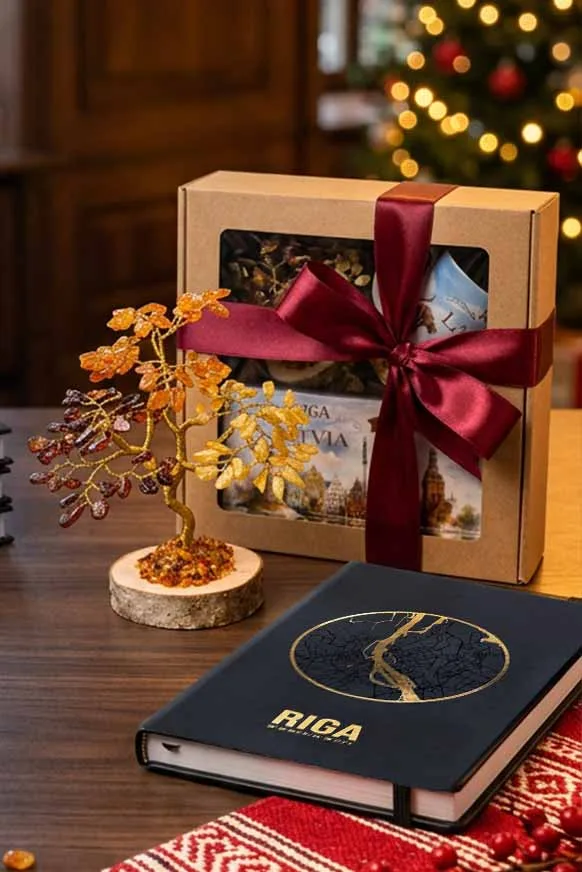 Amber money tree on a wooden slice, Riga notebook and a gift set with Riga motifs